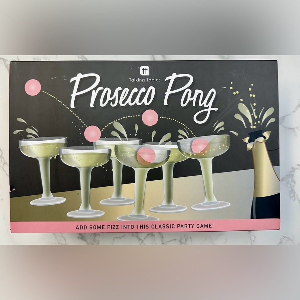 Talking Tables Prosecco Pong Party Game with champagne glasses and pink balls